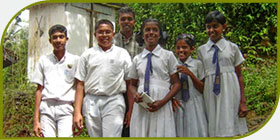 Students with the English teacher from M/Alapaladeniya Maha Vidyalaya, Morawaka